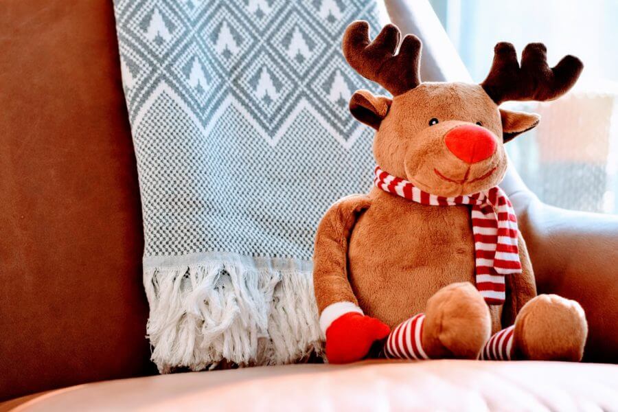 Christmas Reindeer Doll on couch