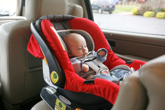Baby on a car seat